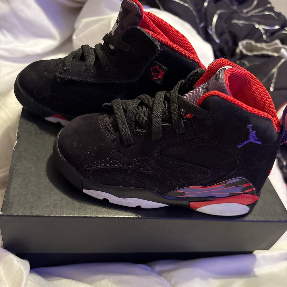 Kids Black and Jordan Red Sneakers With Blur Accents